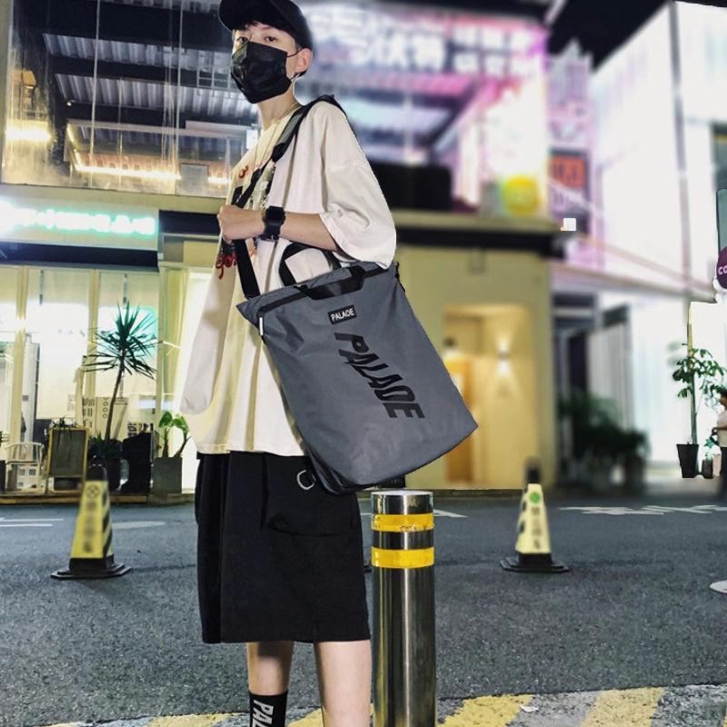 夜間潮流側背情境圖工廠訂做都會手提側背雙肩後背包B118台灣專業包包代工廠